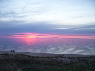 Sunset over Lake Michigan at Nordhouse Dunes in Manistee National Forest, Michigan, United States.